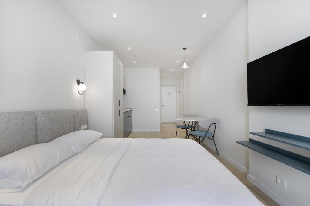 Postel nebo postele na pokoji v ubytování Next Apartments OFFICIAL