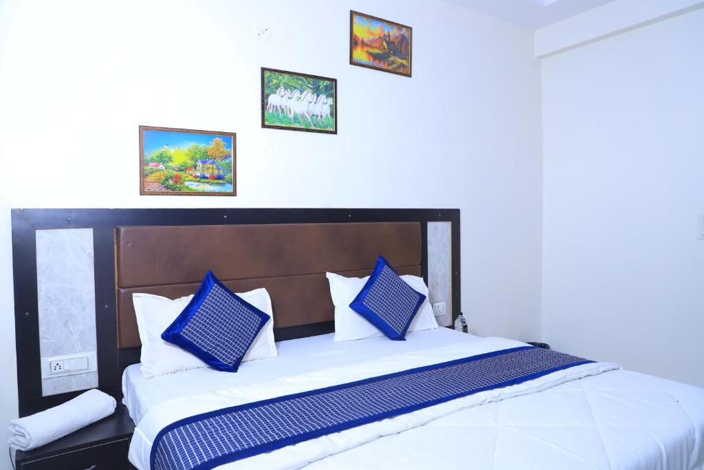 Postel nebo postele na pokoji v ubytování Hotel Elite inn