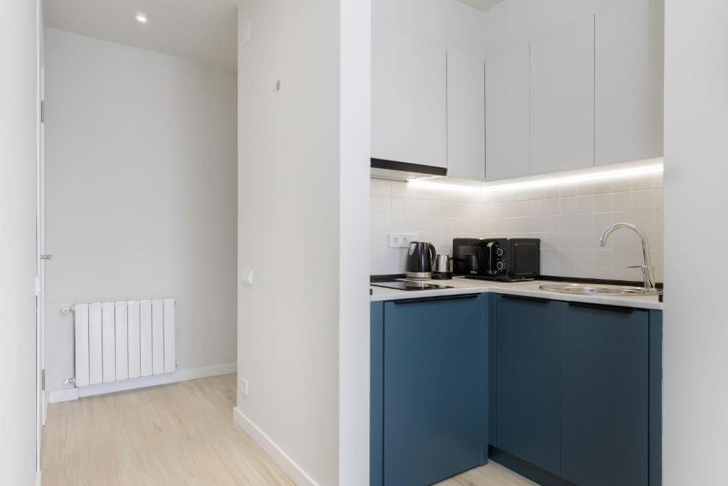Kuchyň nebo kuchyňský kout v ubytování Next Apartments OFFICIAL