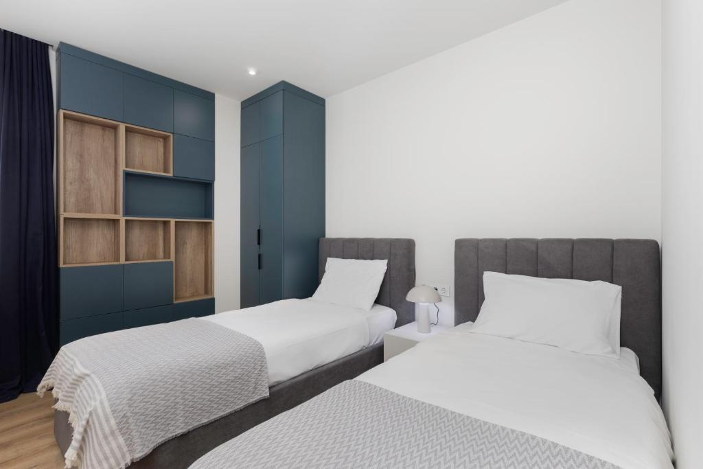 Postel nebo postele na pokoji v ubytování Next Apartments OFFICIAL