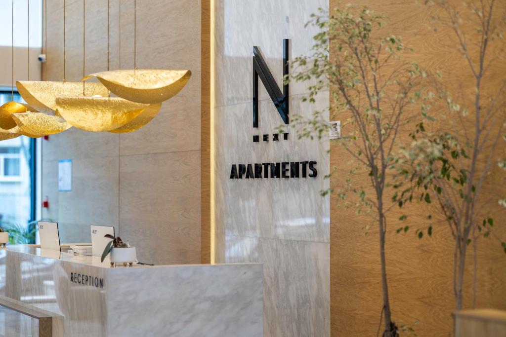 Certifikát, hodnocení, plakát nebo jiný dokument vystavený v ubytování Next Apartments OFFICIAL