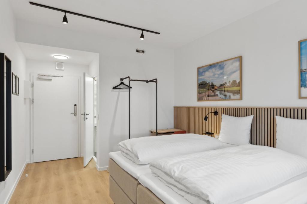 Postel nebo postele na pokoji v ubytování Easy Stay