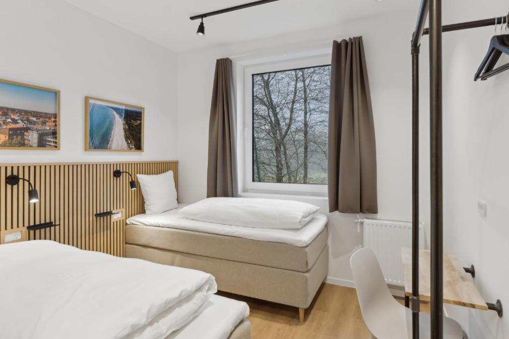 Postel nebo postele na pokoji v ubytování Easy Stay