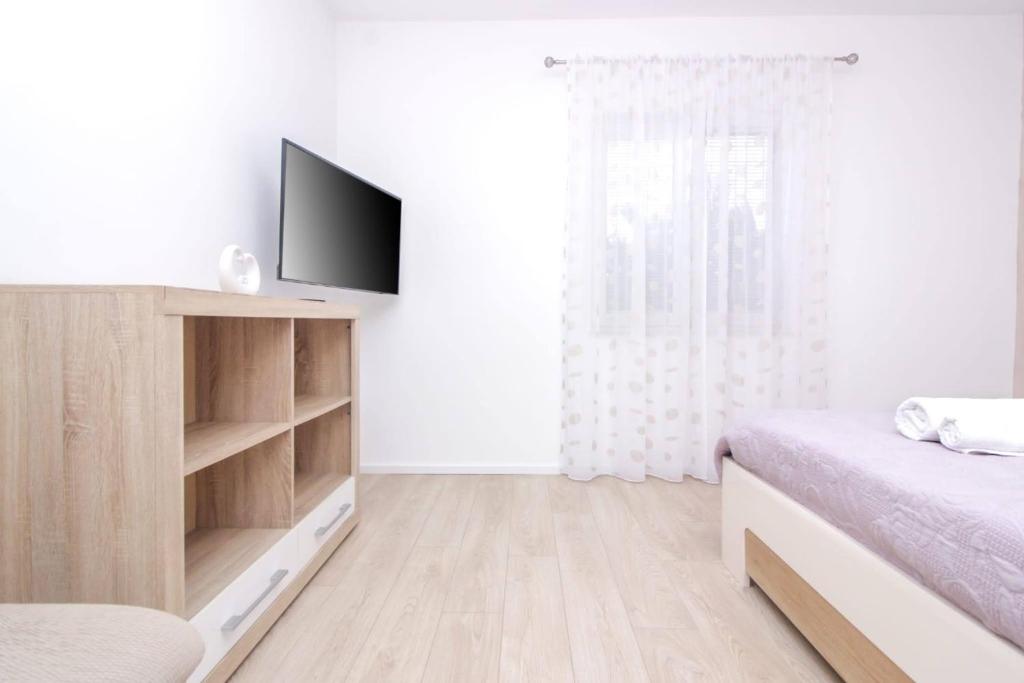 Posteľ alebo postele v izbe v ubytovaní Pool house LUKA