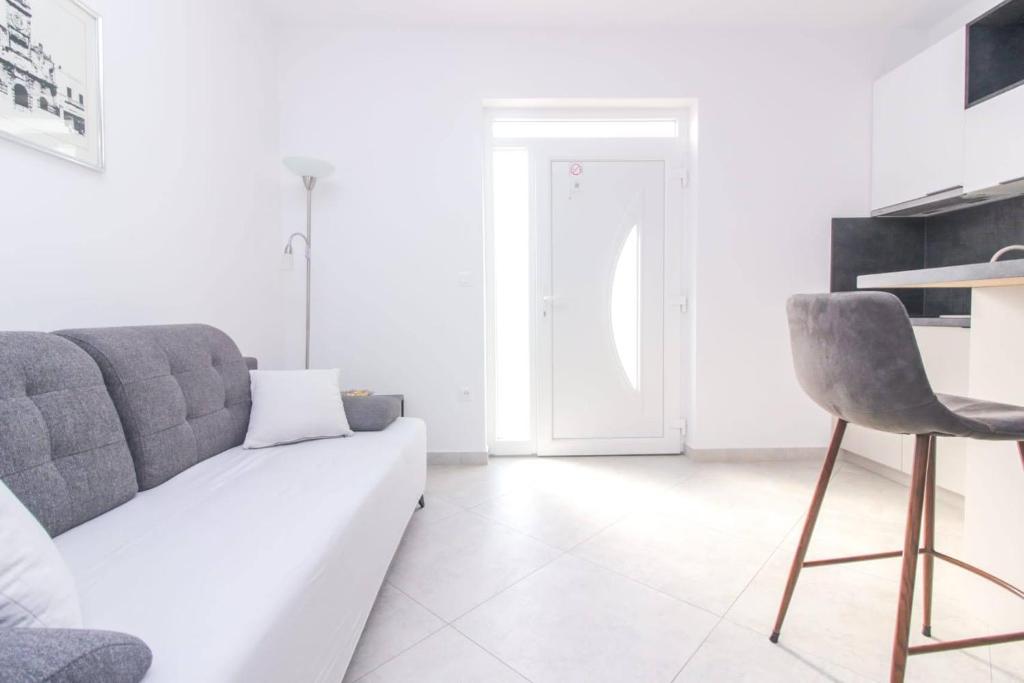 Televízia a/alebo spoločenská miestnosť v ubytovaní Pool house LUKA