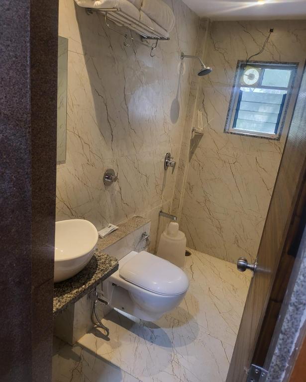 Koupelna v ubytování Hotel Sai D-lax