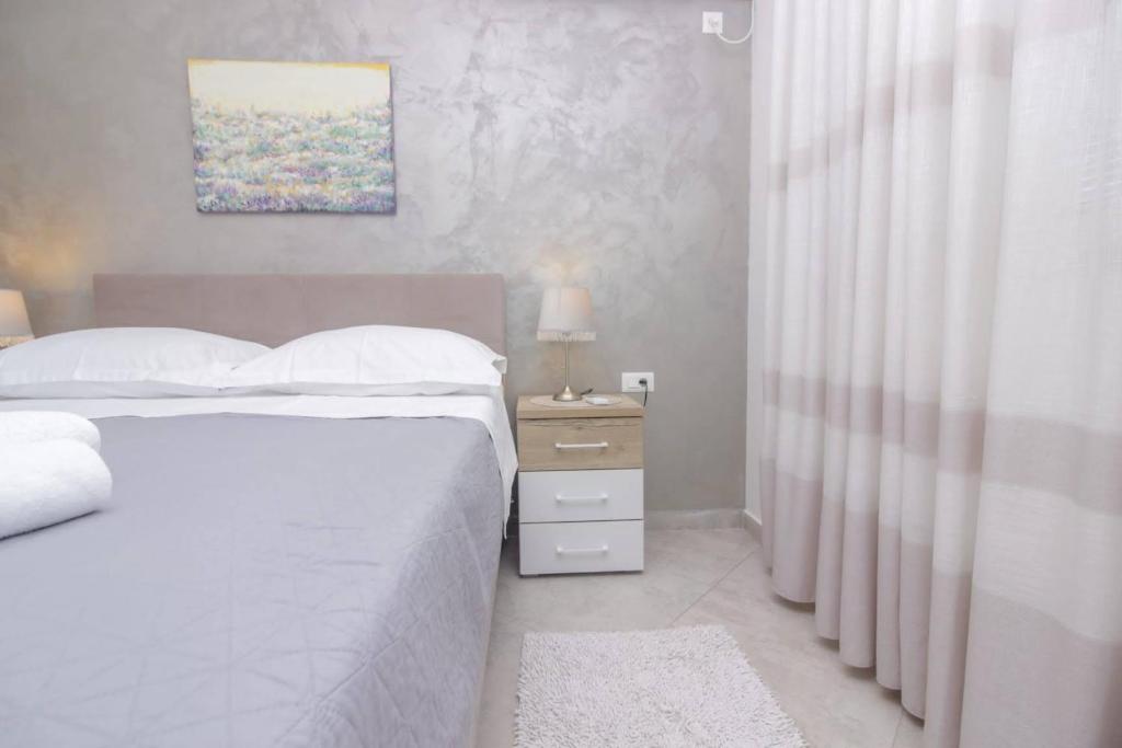 Posteľ alebo postele v izbe v ubytovaní Pool house LUKA