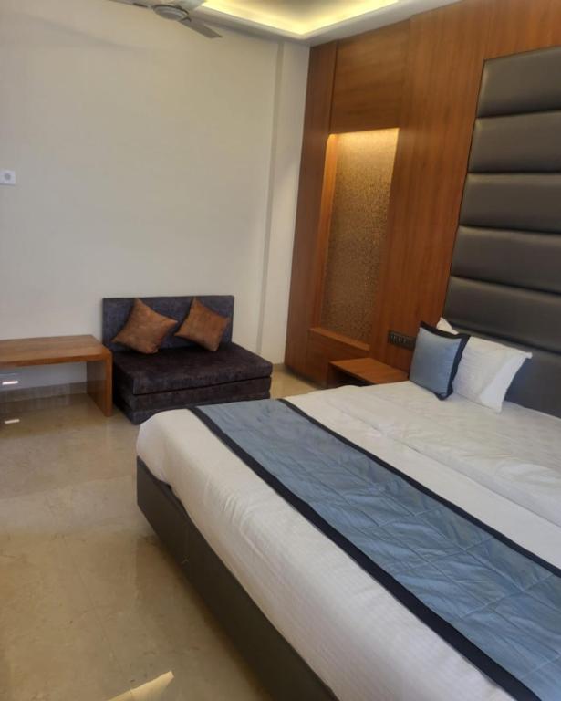 Postel nebo postele na pokoji v ubytování Hotel Sai D-lax