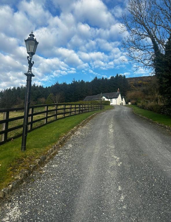 a street light on the side of a road at Yewwood Cottage in Newry
