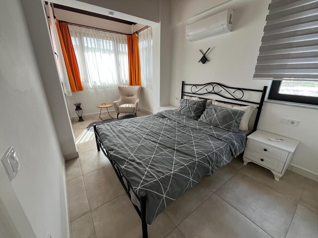 Postel nebo postele na pokoji v ubytování Derya Beach Agullu Villa