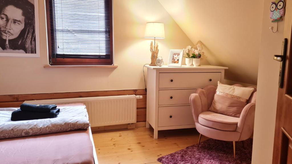 Posteľ alebo postele v izbe v ubytovaní Apartamenty SPOKOLOKO Letniczówka Widoki