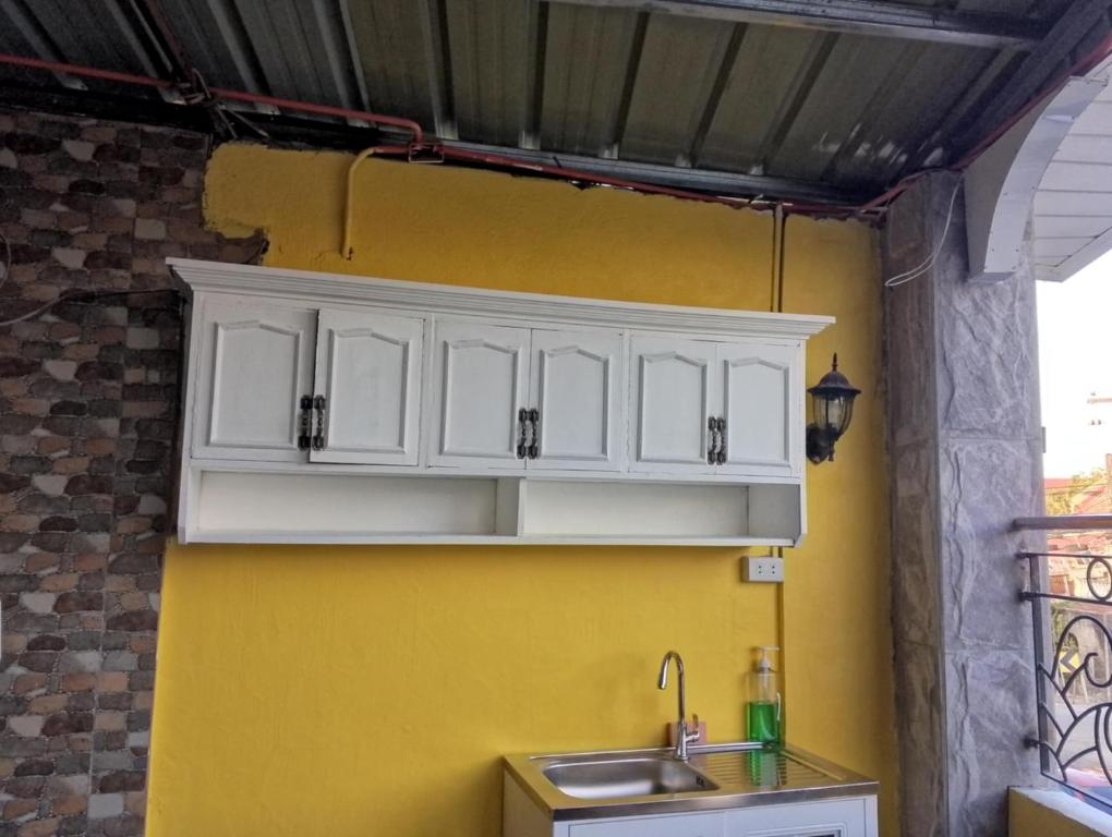 Kuchyň nebo kuchyňský kout v ubytování Vhauschild Transient Rooms
