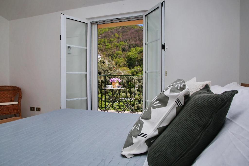 Postel nebo postele na pokoji v ubytování Ardesia apartment