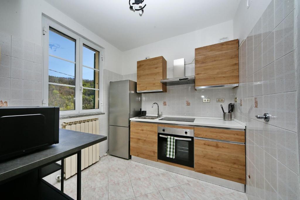 Kuchyň nebo kuchyňský kout v ubytování Ardesia apartment