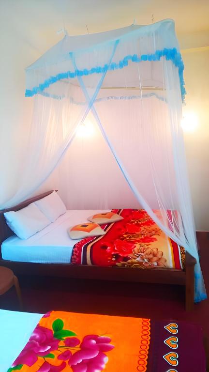 Postel nebo postele na pokoji v ubytování Senehas Homestay