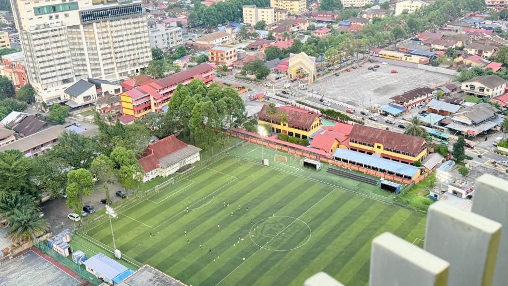 an aerial view of a park in a city at Colony Service Suites Kuala Lumpur in Kuala Lumpur