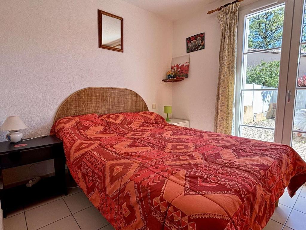 Łóżko lub łóżka w pokoju w obiekcie Maison T3 avec mezzanine, piscine, parking, proche mer - Argelès-sur-Mer - FR-1-225-774