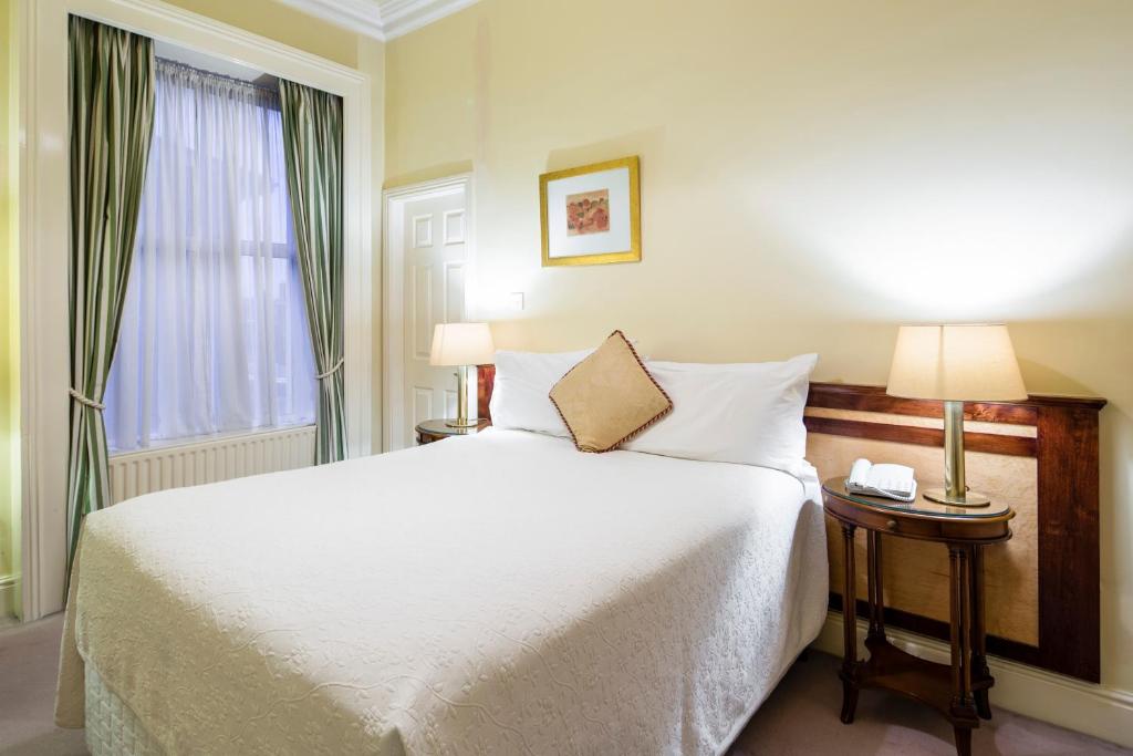 Postel nebo postele na pokoji v ubytování Aberdeen Lodge