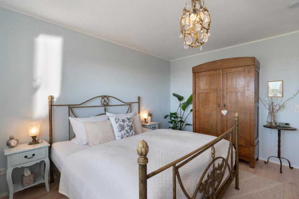 Postel nebo postele na pokoji v ubytování Ferienwohnung Panorama - Suite