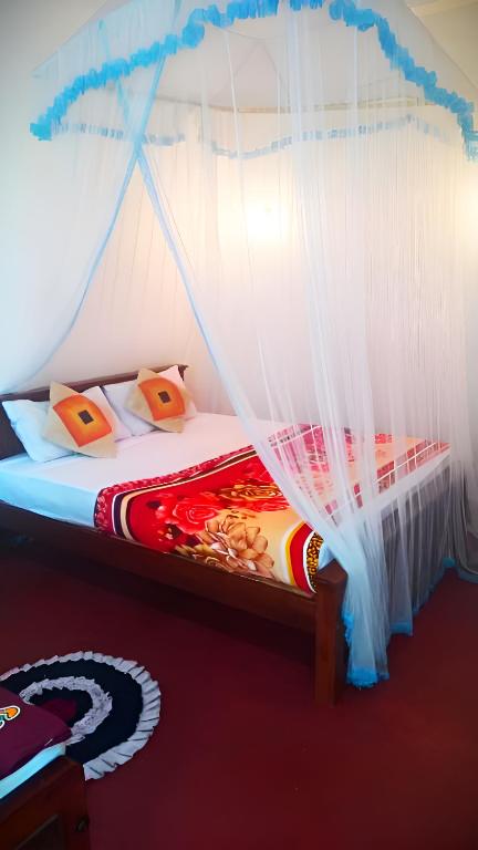 Postel nebo postele na pokoji v ubytování Senehas Homestay