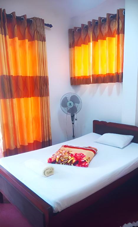 Postel nebo postele na pokoji v ubytování Senehas Homestay