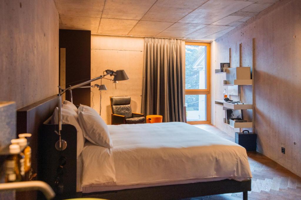Postel nebo postele na pokoji v ubytování Hôtel Borsari, A Member of Design Hotels