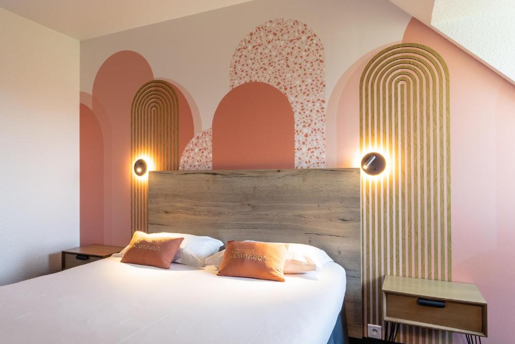 Postel nebo postele na pokoji v ubytování Relais Amadourien