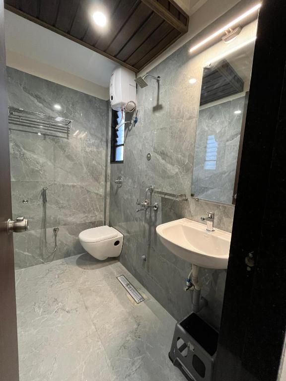 Koupelna v ubytování Kuber Suites