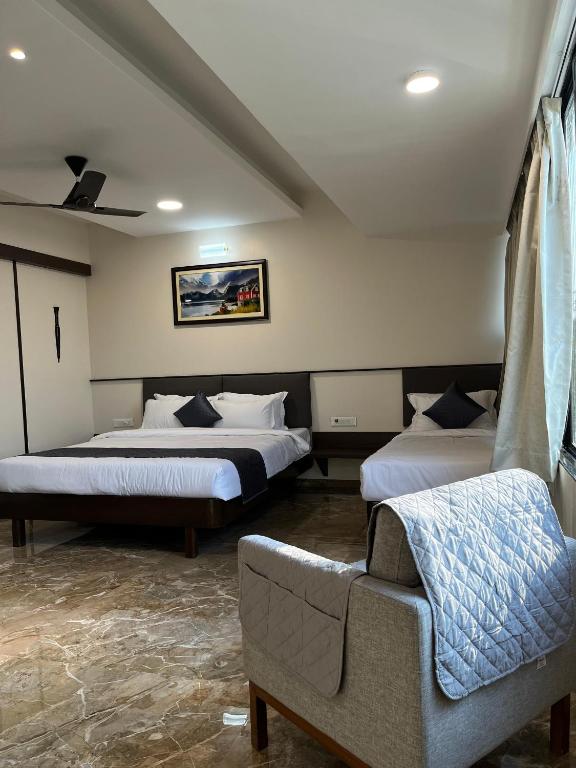 Postel nebo postele na pokoji v ubytování Kuber Suites