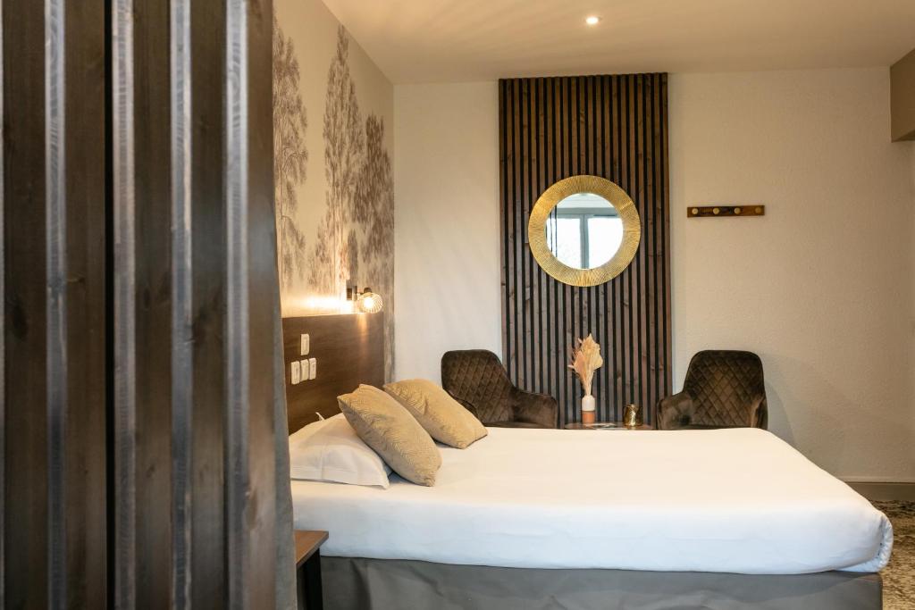 Postel nebo postele na pokoji v ubytování Relais Amadourien