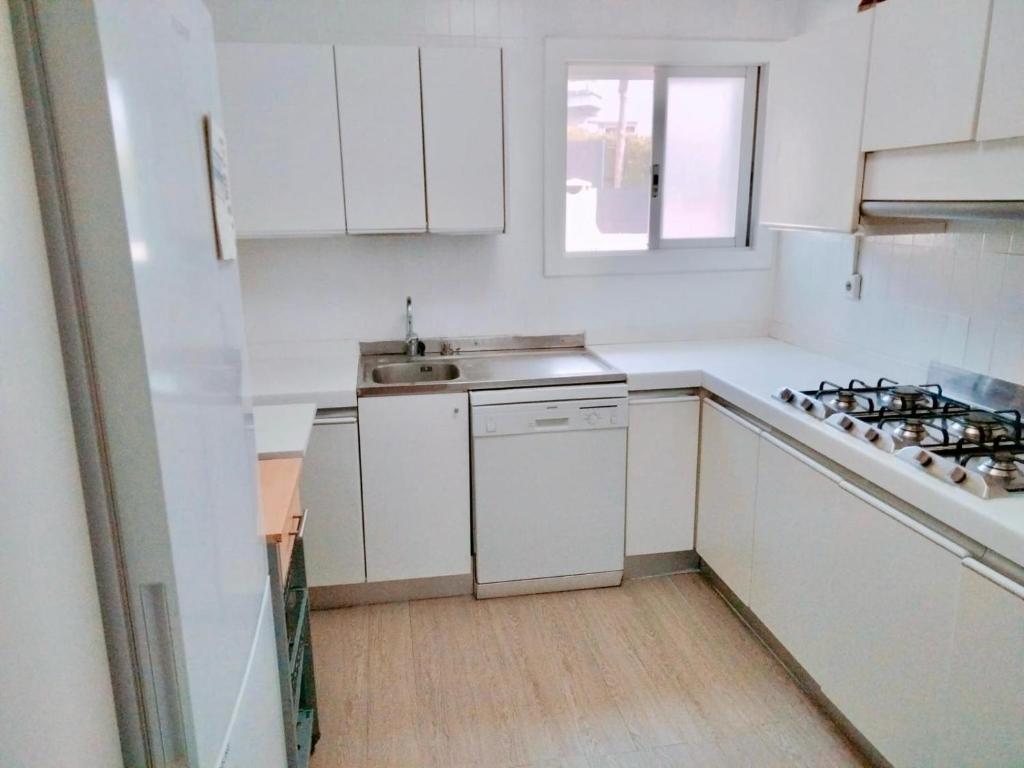 Kuchyň nebo kuchyňský kout v ubytování Bruc Apartment Beach
