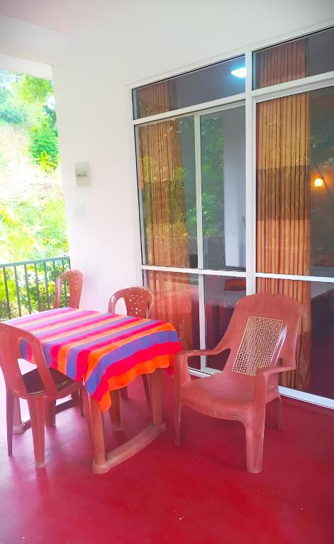 Balkón nebo terasa v ubytování Senehas Homestay