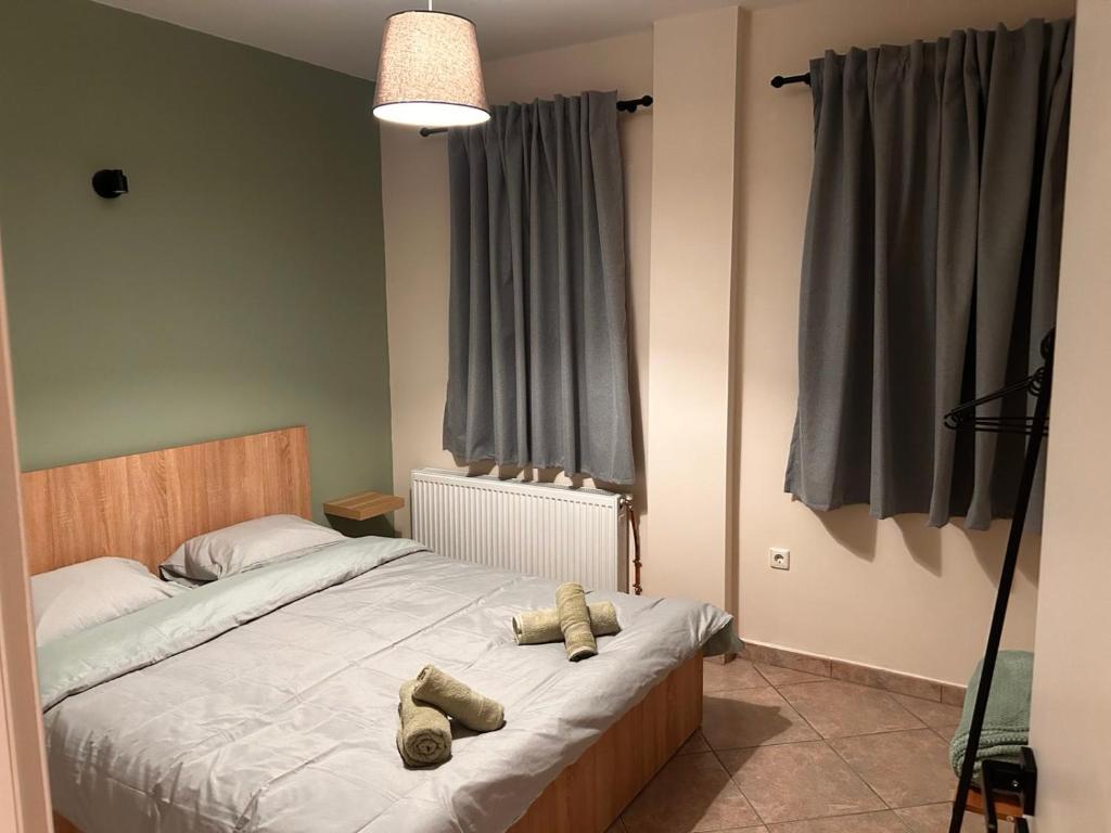 Postel nebo postele na pokoji v ubytování Villa Liolios