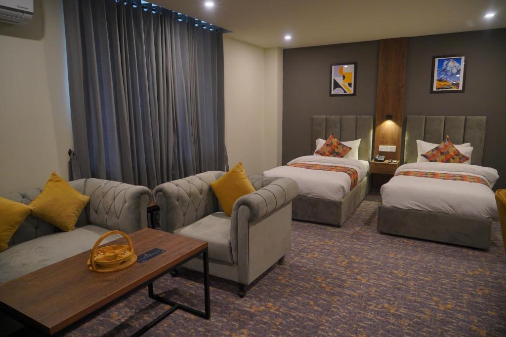 Postel nebo postele na pokoji v ubytování Destination Hotel Gilgit