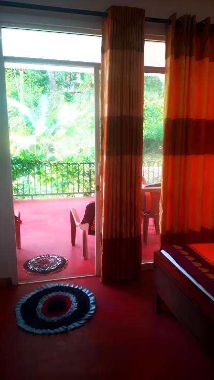 Postel nebo postele na pokoji v ubytování Senehas Homestay
