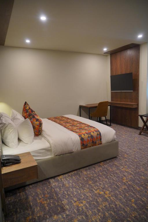 Postel nebo postele na pokoji v ubytování Destination Hotel Gilgit