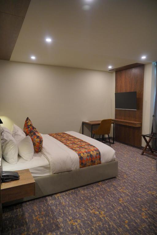 Postel nebo postele na pokoji v ubytování Destination Hotel Gilgit