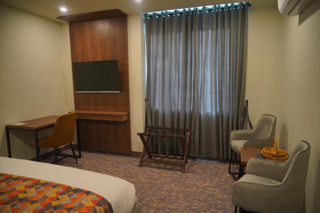 Postel nebo postele na pokoji v ubytování Destination Hotel Gilgit