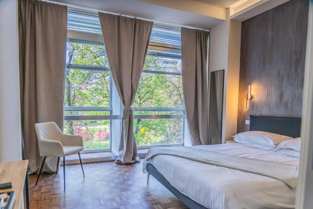Postel nebo postele na pokoji v ubytování Giardini Rooms