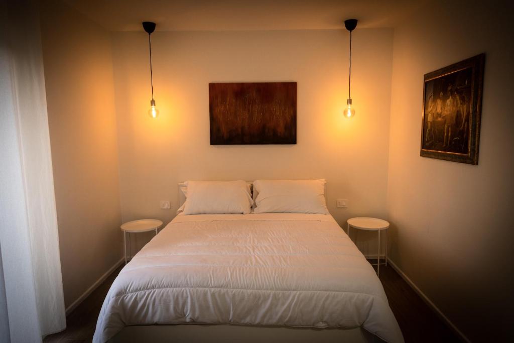 Postel nebo postele na pokoji v ubytování Chez Nunù