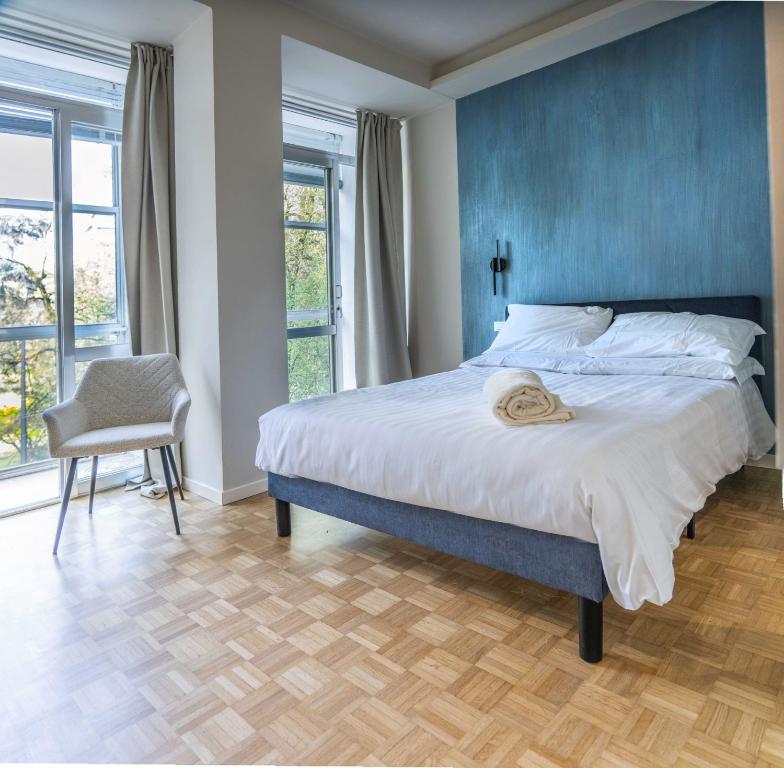Postel nebo postele na pokoji v ubytování Giardini Rooms