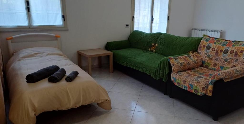 Postel nebo postele na pokoji v ubytování Casa Vacanze AML