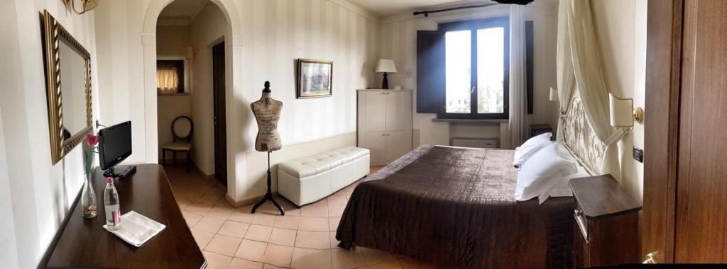 TV a/nebo společenská místnost v ubytování Arca Hotel