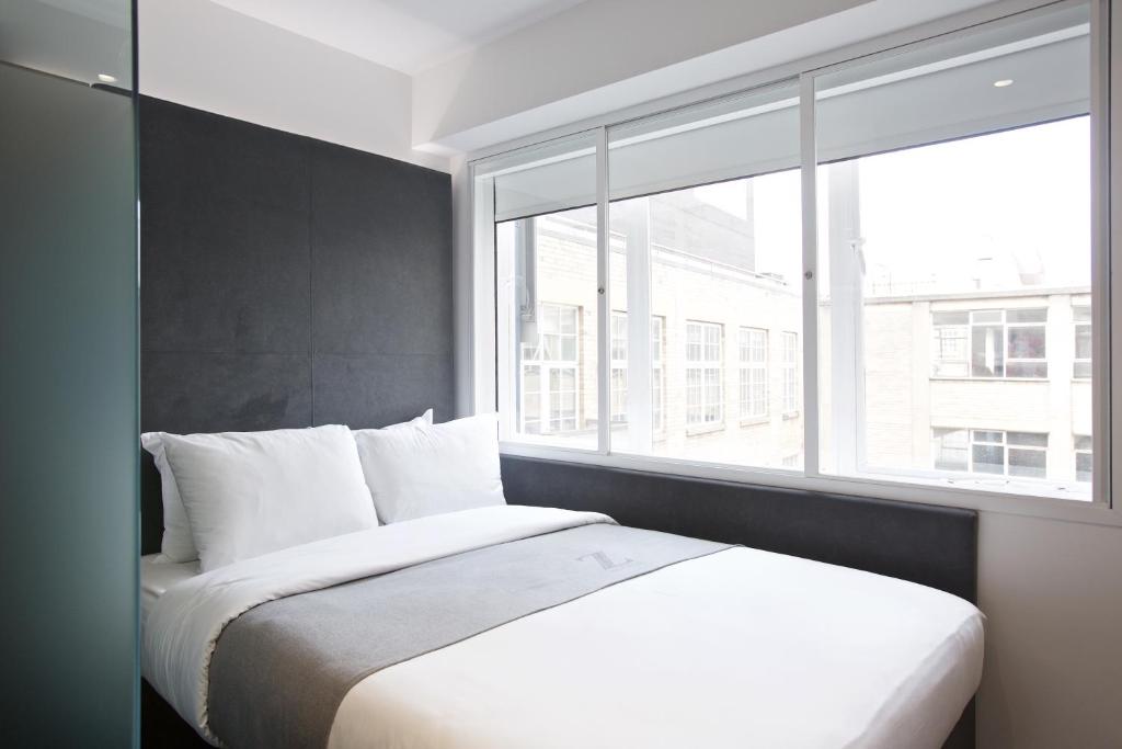 Postel nebo postele na pokoji v ubytování The Z Hotel Leicester Square