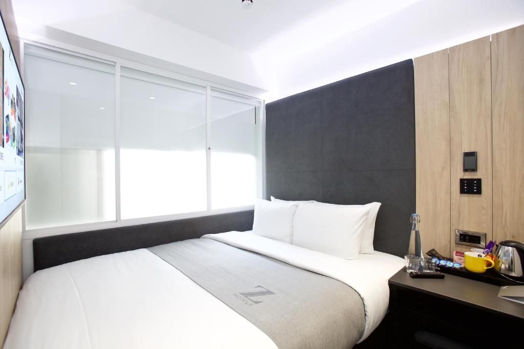 Postel nebo postele na pokoji v ubytování The Z Hotel Leicester Square