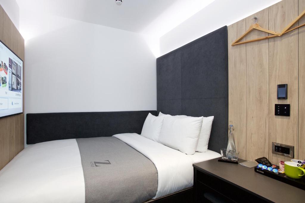 Postel nebo postele na pokoji v ubytování The Z Hotel Leicester Square