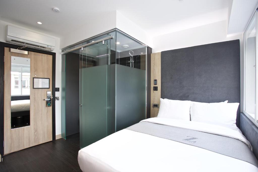 Postel nebo postele na pokoji v ubytování The Z Hotel Leicester Square