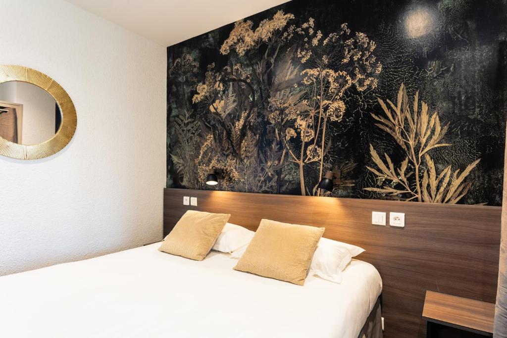 Postel nebo postele na pokoji v ubytování Relais Amadourien