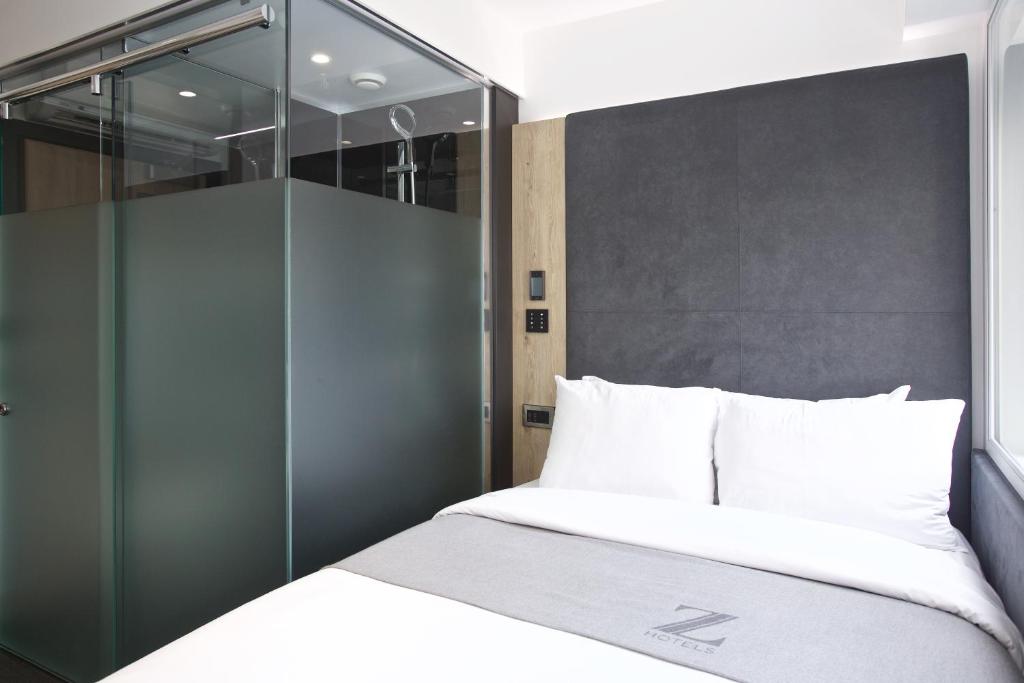Postel nebo postele na pokoji v ubytování The Z Hotel Leicester Square