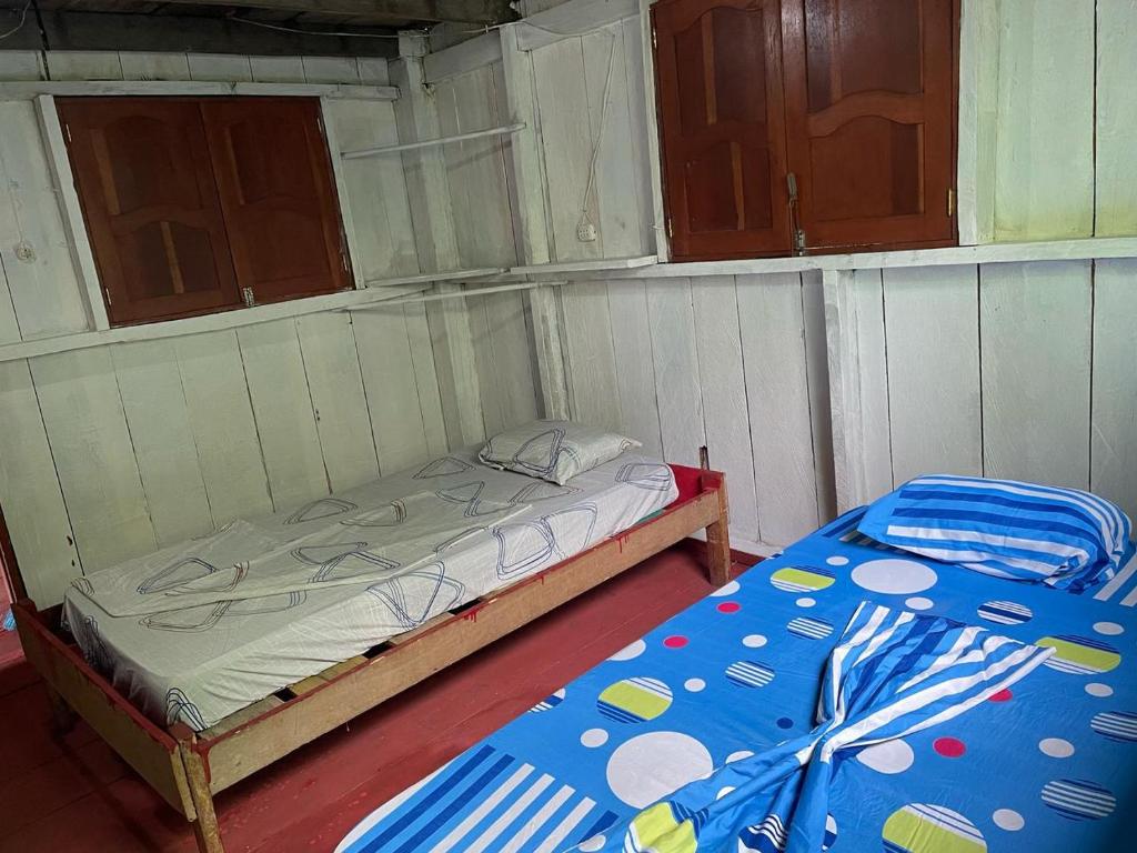 Postel nebo postele na pokoji v ubytování Coya Hostel